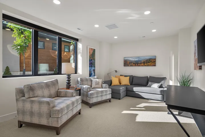 Bedroom 3.  Large windows with lots of natural light.