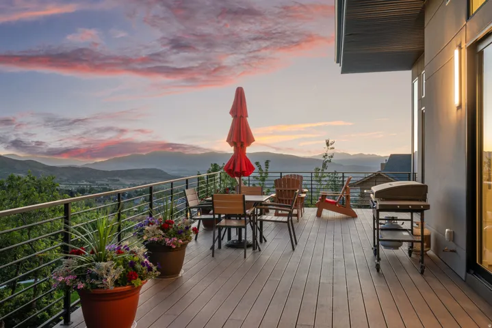 Expansive outdoor deck off the kitchen & dining with amazing views to the mountains and valley