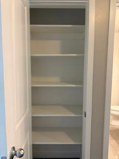 Integrated shelving with multiple levels of storage