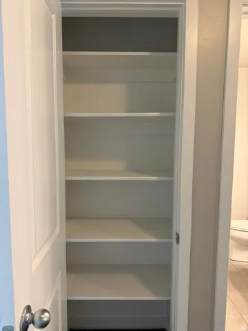 Integrated shelving with multiple levels of storage