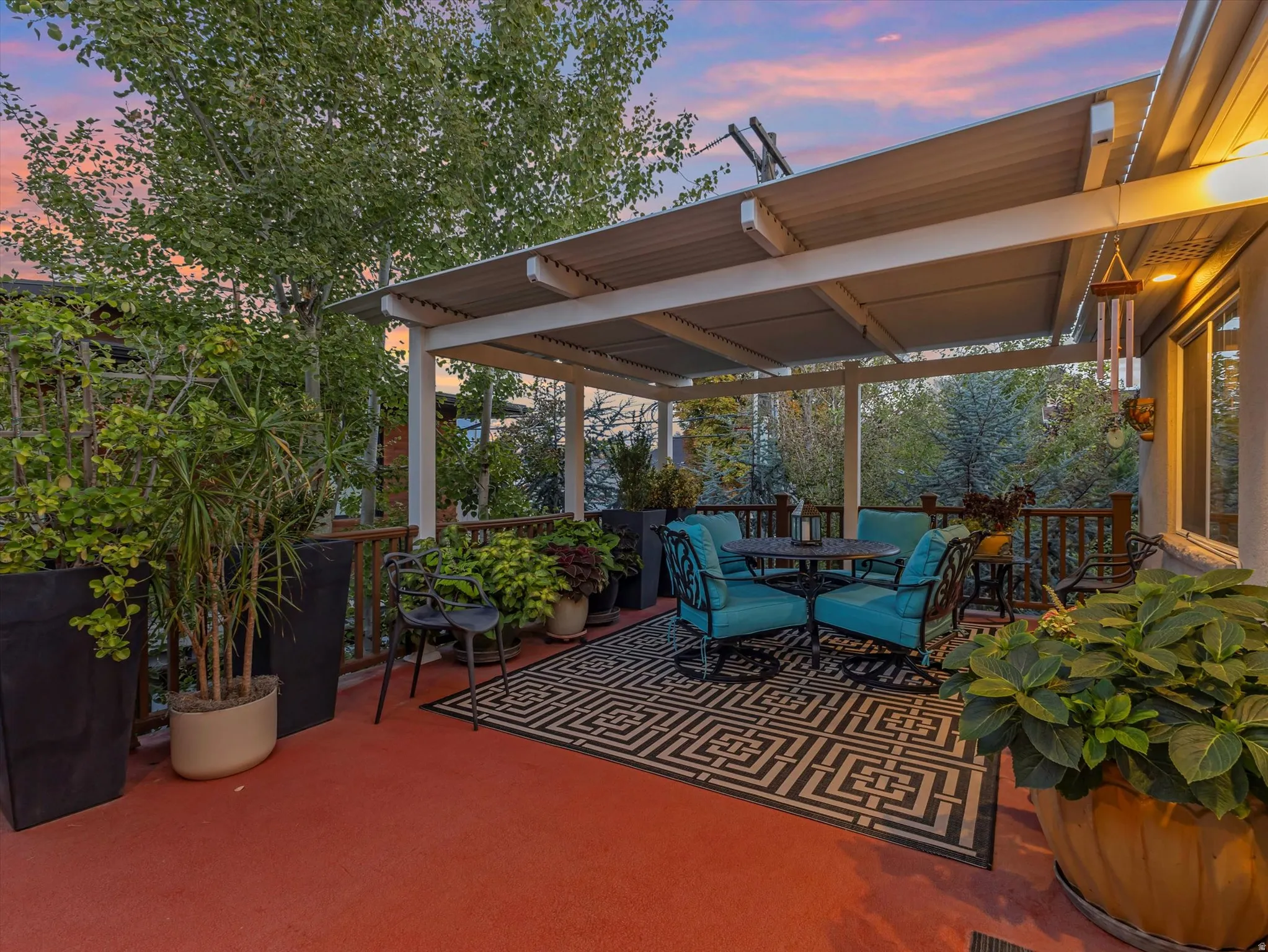 View of deck featuring a pergola and outdoor dining space