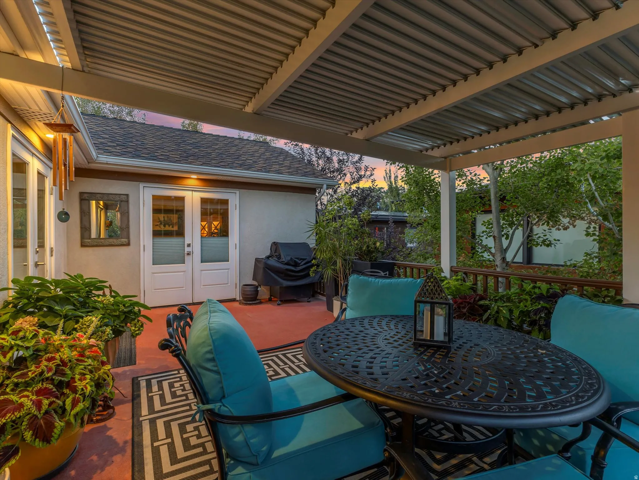 View of patio / terrace featuring french doors, outdoor dining area, and grilling area