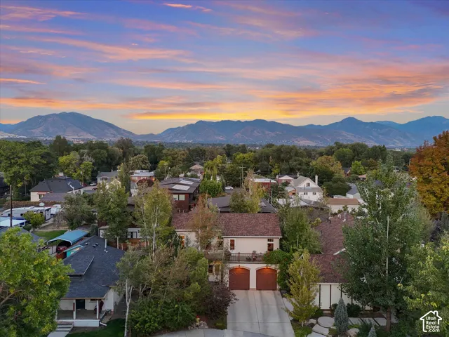 Aerial view at dusk of a mountain view and a residential view