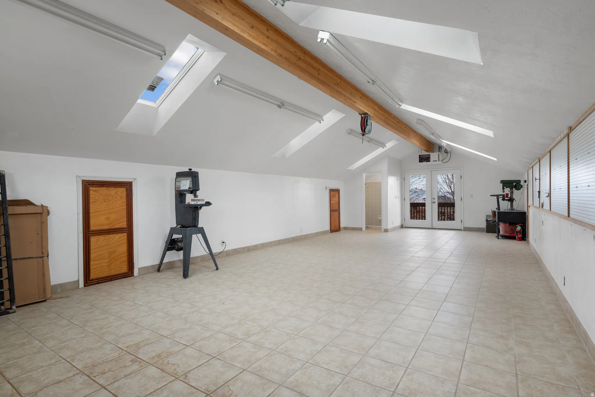 Workshop above the detached garage.  Power, Heat, AC, compressor.