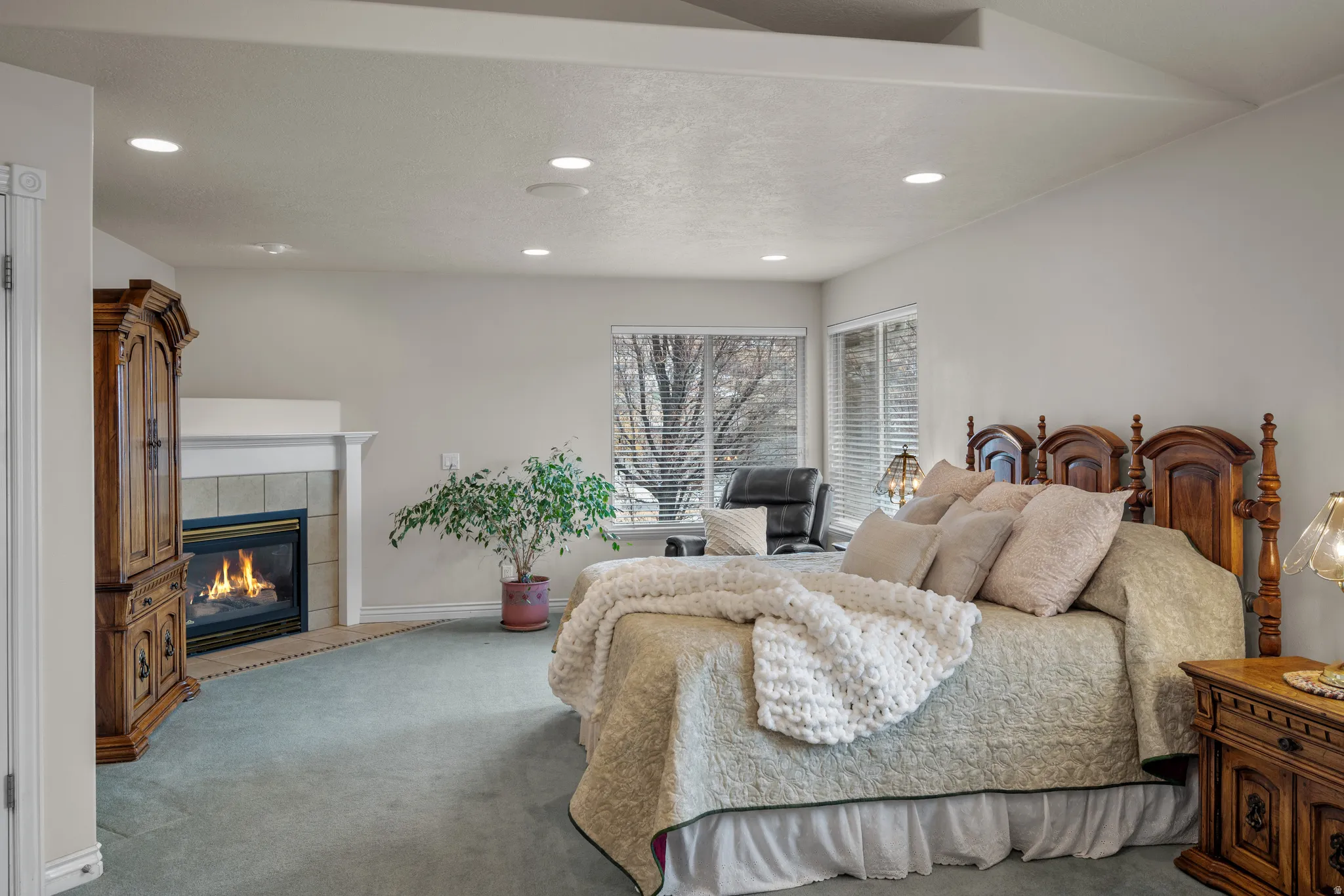 Spacious Primary bedroom with gas fireplace