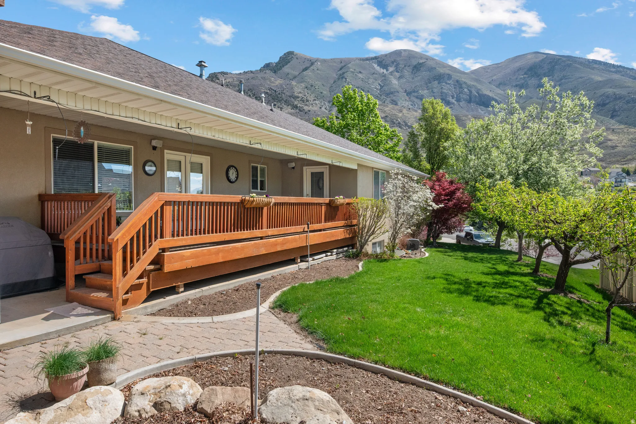 Rear exterior with a wood deck