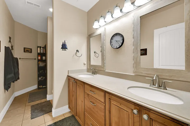 Double vanity and tons of lighting.