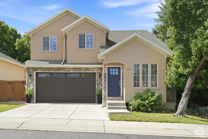 Stucco exterior with stone veneer accents