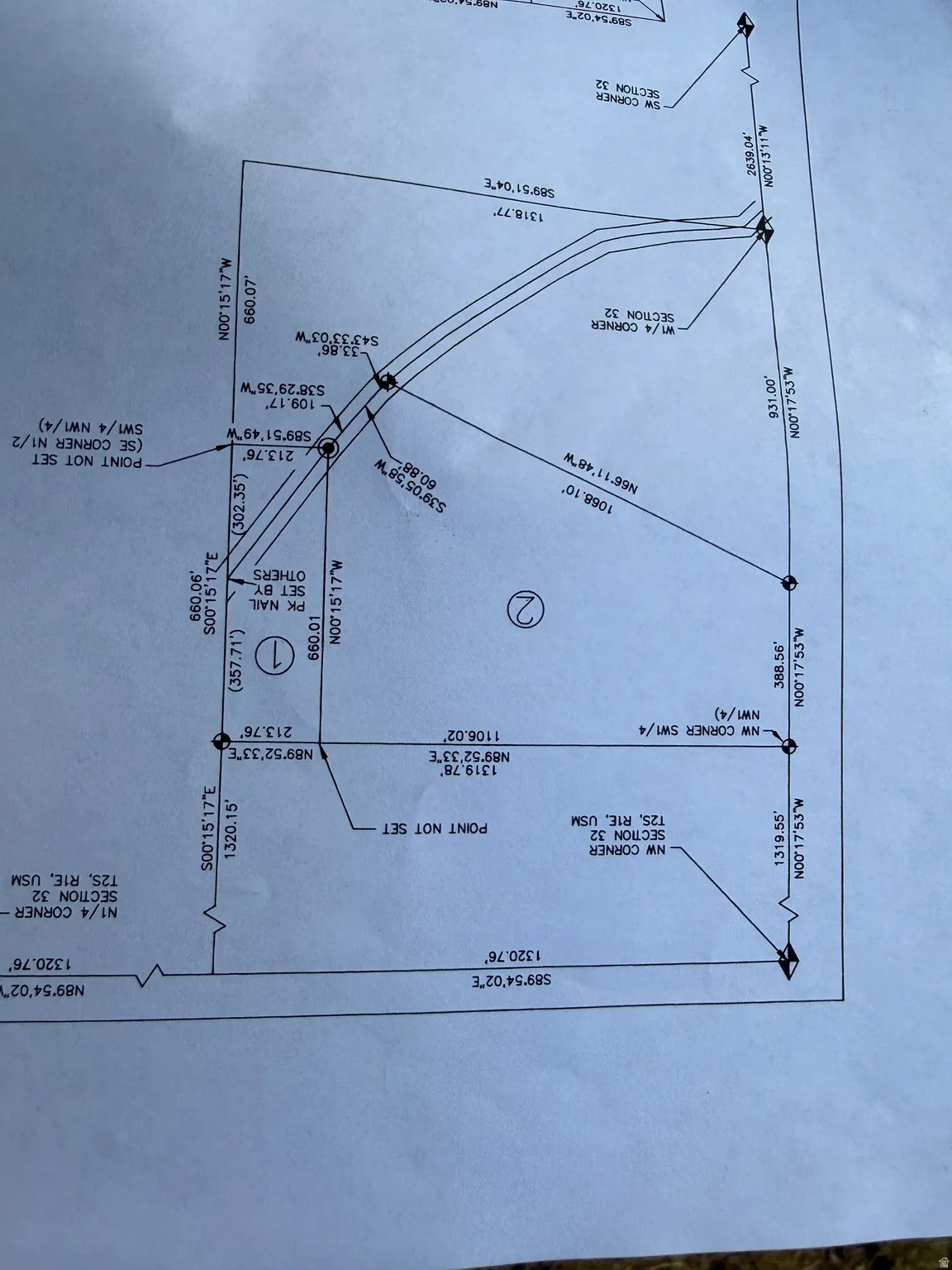Survey Plat. Illustrating boundary lines, measurements, and corner designations for the property