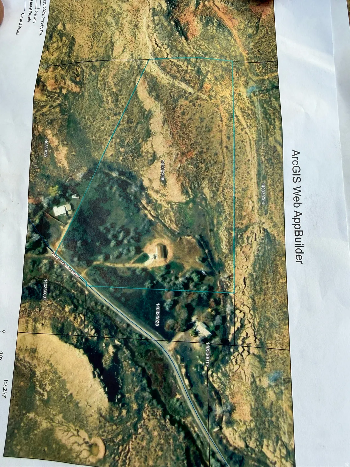 ArcGIS Web AppBuilder Map. Depicting an aerial view of the property with boundary lines and identifying features