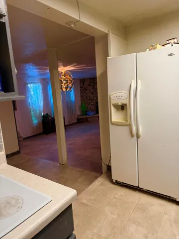 Kitchen area featuring a built-in electric stovetop and light-toned countertop