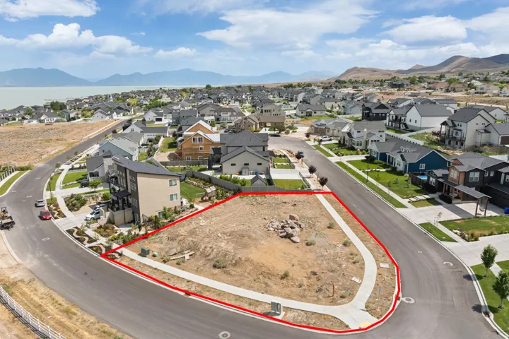 Corner lot featuring level topography, established sidewalks, and street-level access