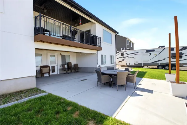 Expansive concrete patio with direct access to interior spaces