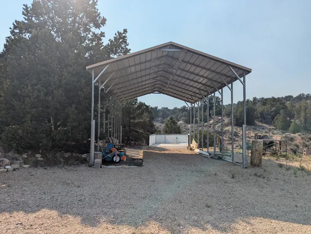 RV cover structure with full hookups.