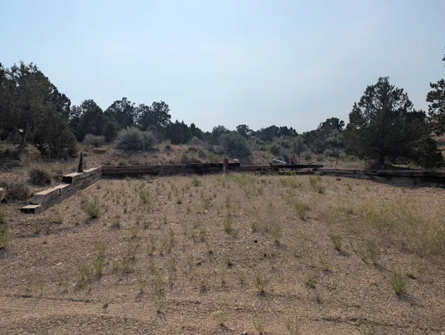 Graveled RV parking area featuring three full hookup areas.