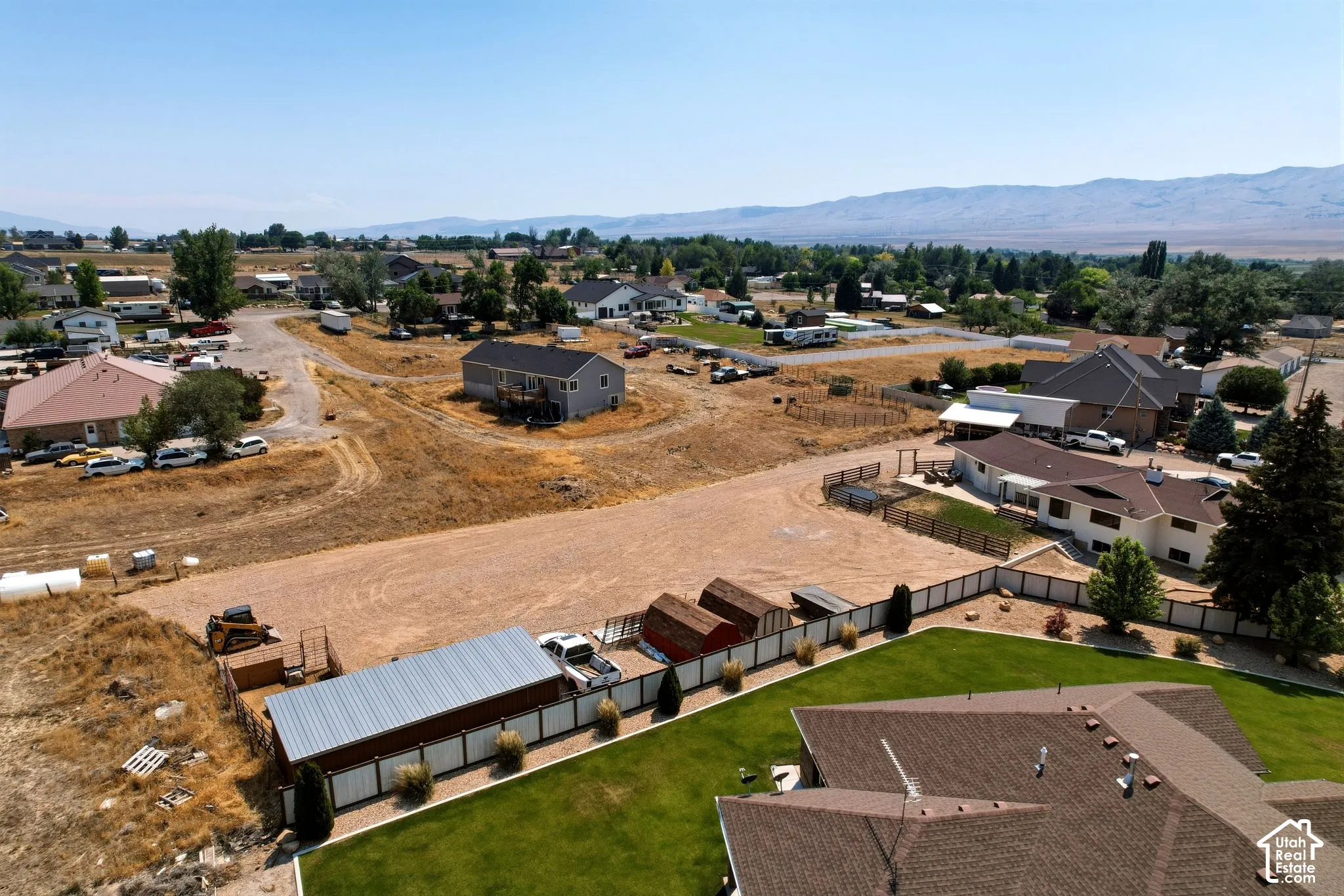 Expansive parcel featuring a large building pad and surrounding graded terrain