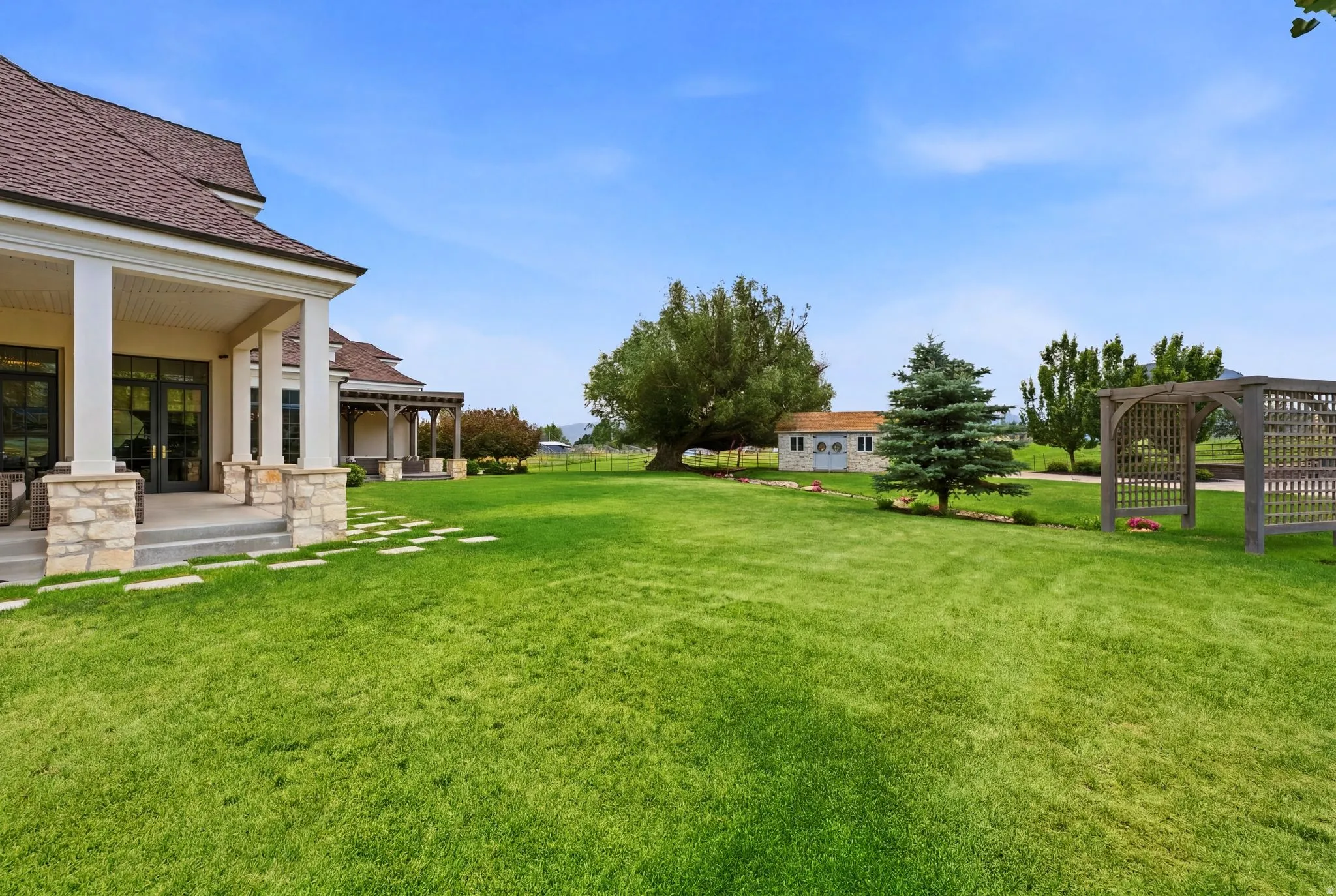 Expansive green lawn providing abundant outdoor space
