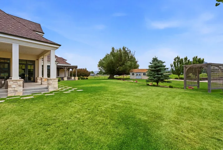 Expansive green lawn providing abundant outdoor space