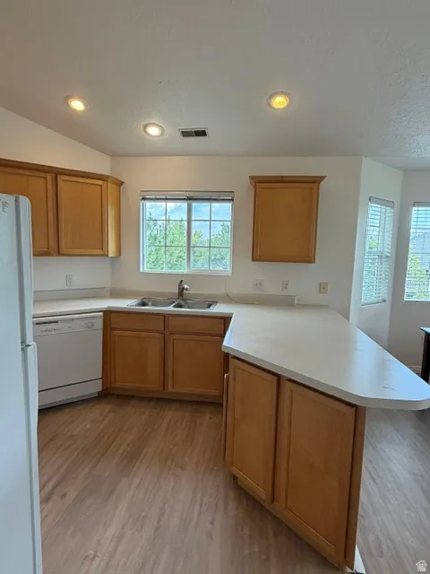 Natural light pours in the kitchen! Lots of cabinetry &  storage!