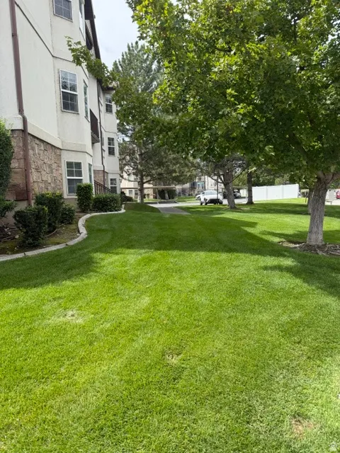 Manicured lawns with mature trees add to the ideal location!