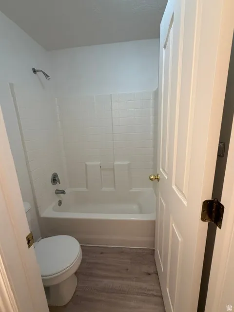 Bathtub and shower combination, white subway tile surround, fresh new paint & LVP floors!