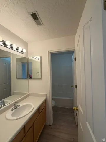 Fresh paint & brand new flooring in Main Bathroom