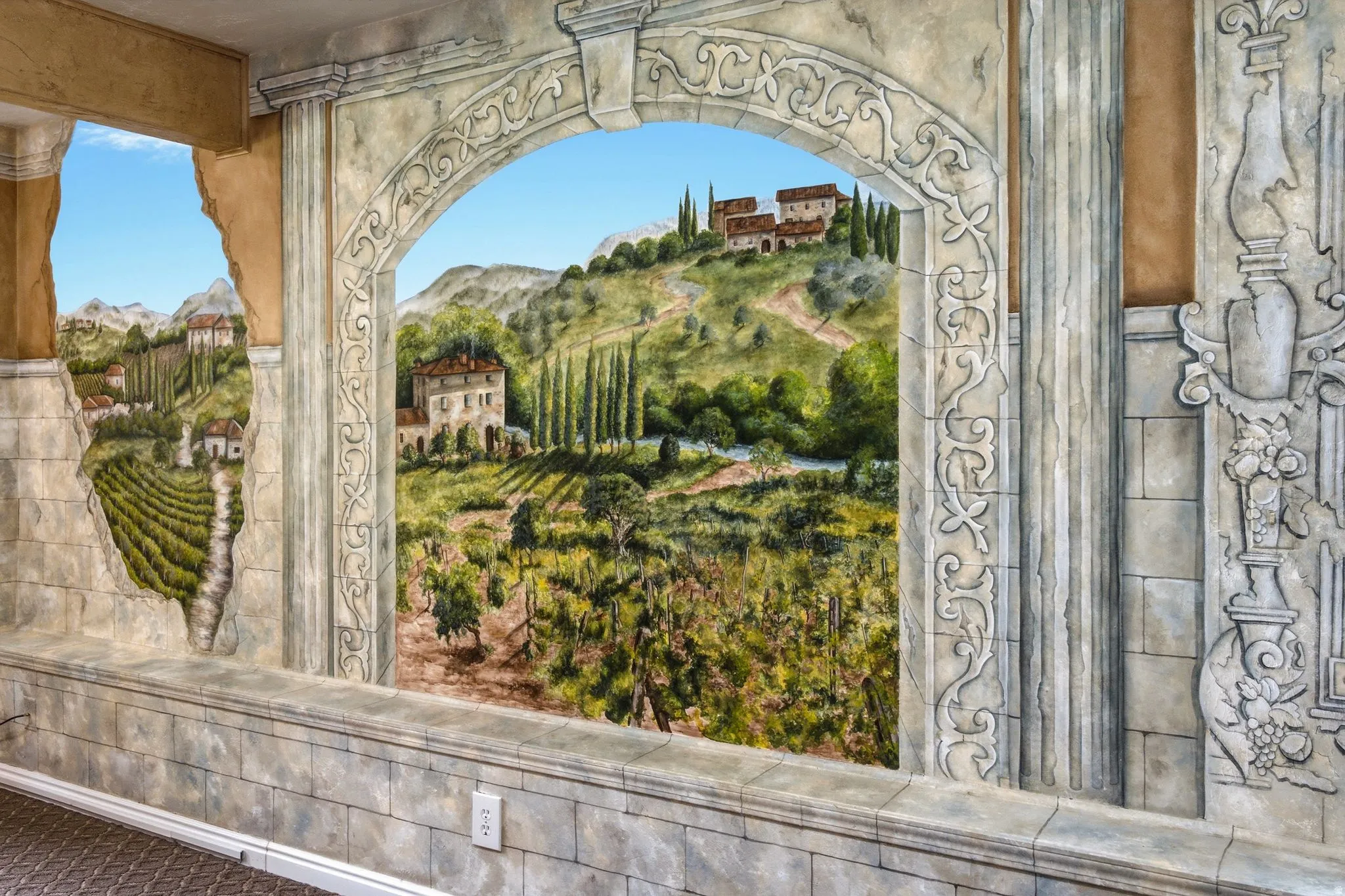 Elaborate scenic wall mural featuring an Italian countryside