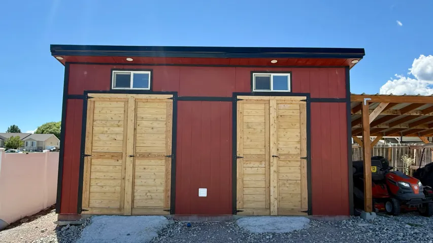 Red vertical siding with black trim