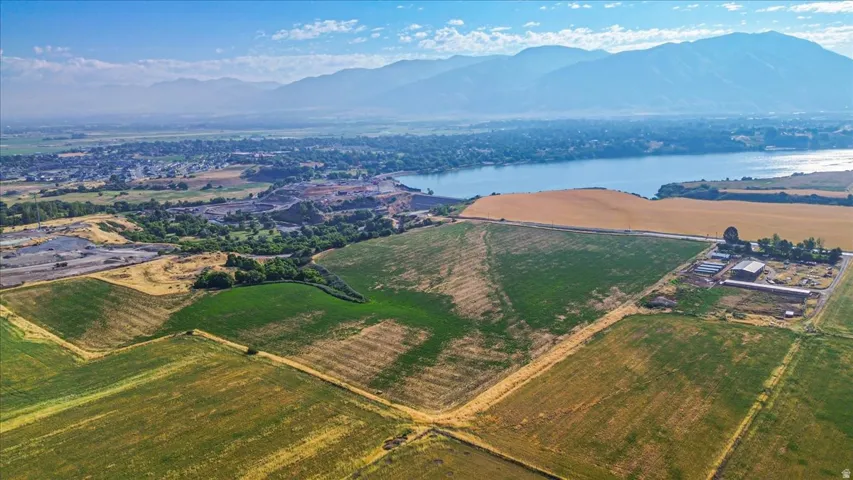 Expansive agricultural fields with varied crops and distinct field divisions