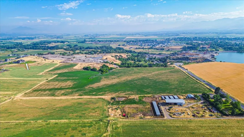 Expansive agricultural land with multiple fields of varying crops