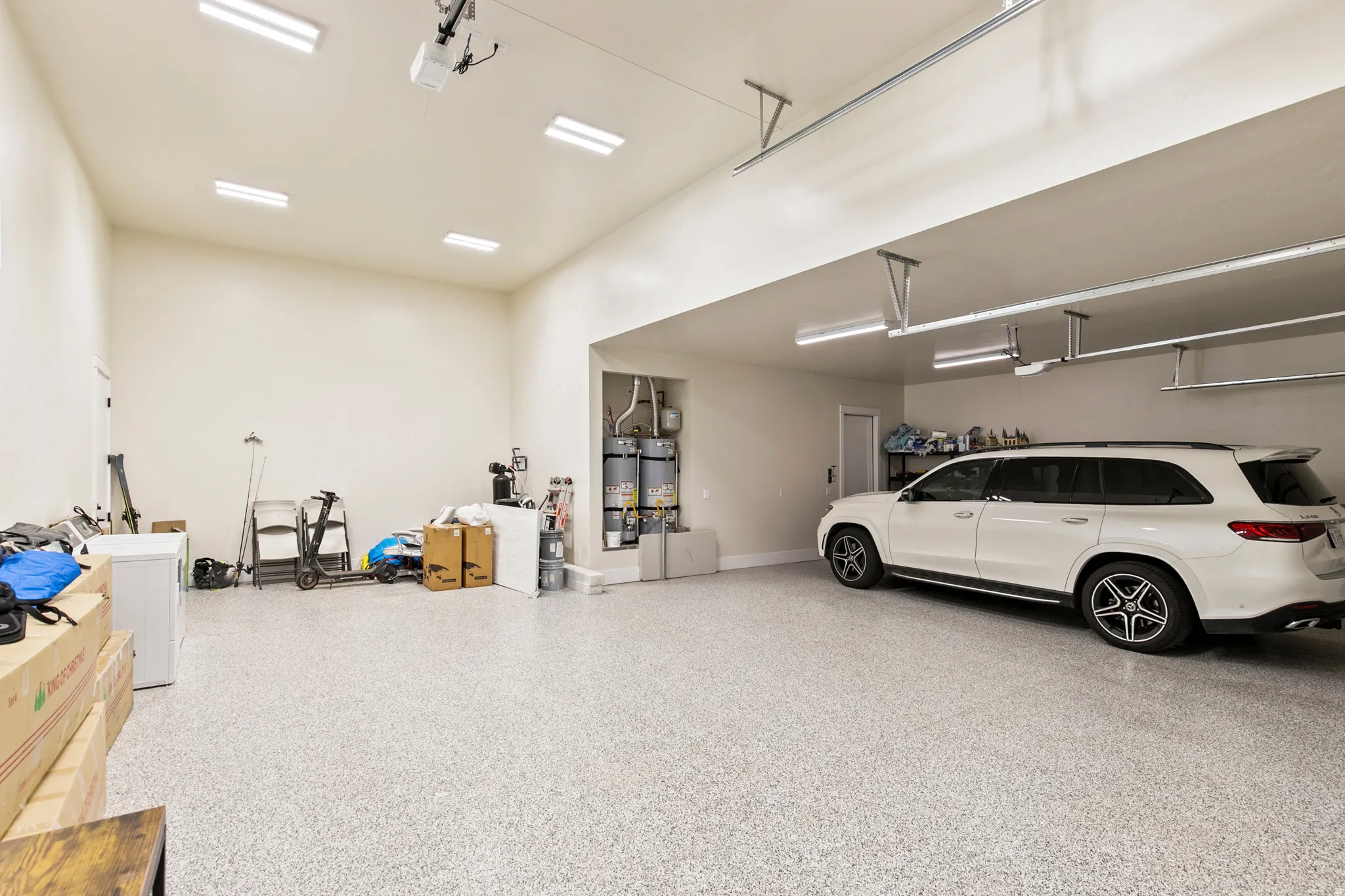 Spacious garage with high ceilings and a durable epoxy-coated floor