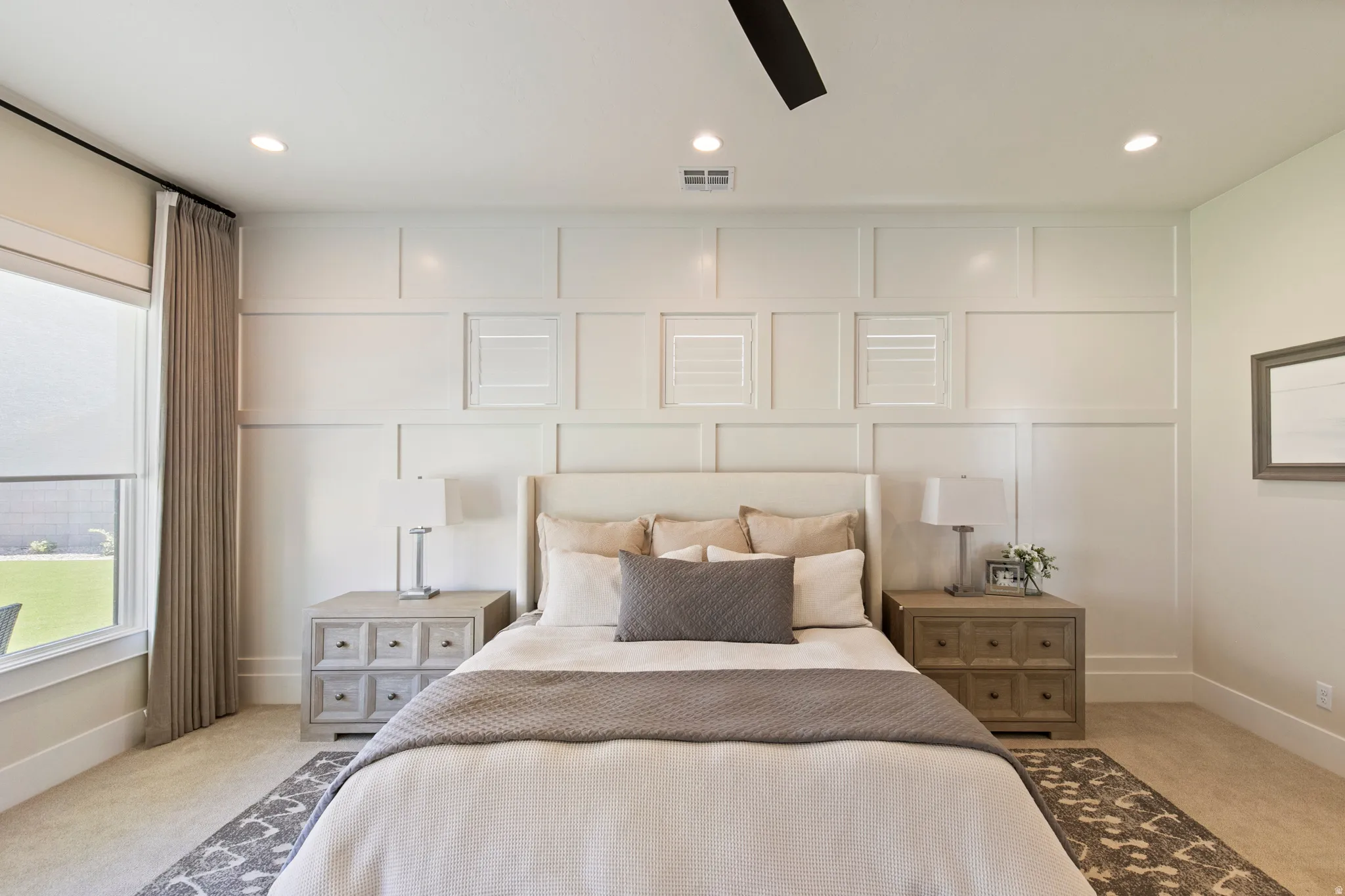 Accent wall featuring decorative paneling