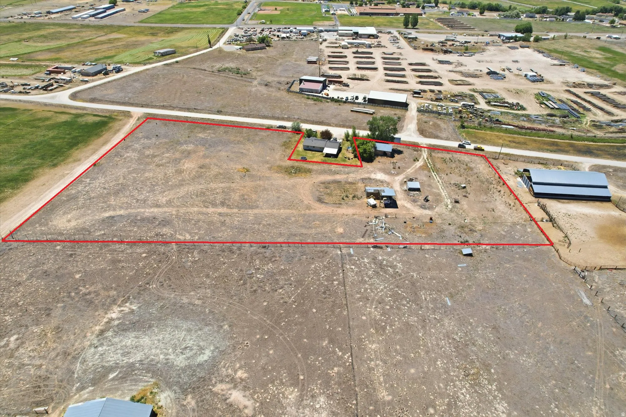 Expansive land parcel with clearly delineated boundaries.  ***Seller and their agents DO NOT assume liability for anyone that goes near or inside the structures.  Please observe from a cautious distance and consult with a professional contractor or struct