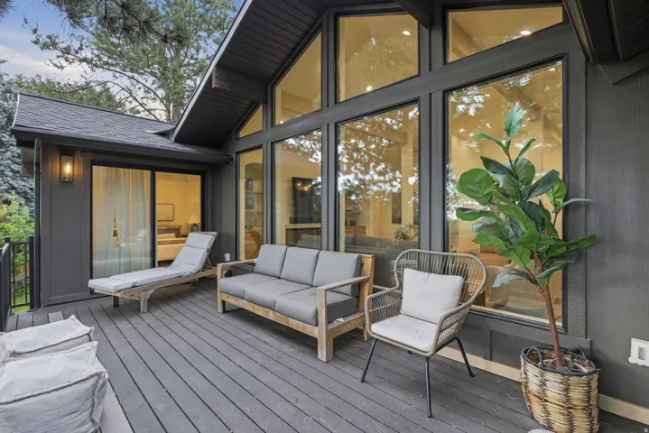 Expansive outdoor deck featuring dark composite decking