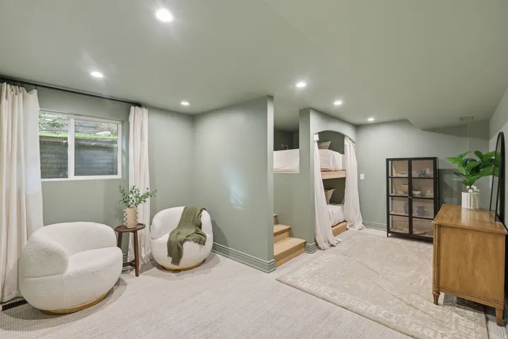 Versatile bonus room featuring recessed lighting and a window with privacy screening