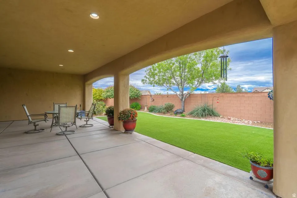 Covered patio featuring recessed lighting and a concrete slab floor