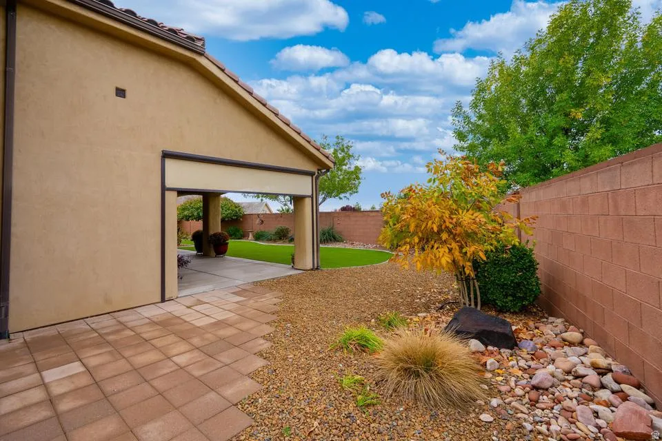 Stucco exterior with a terracotta tile roof