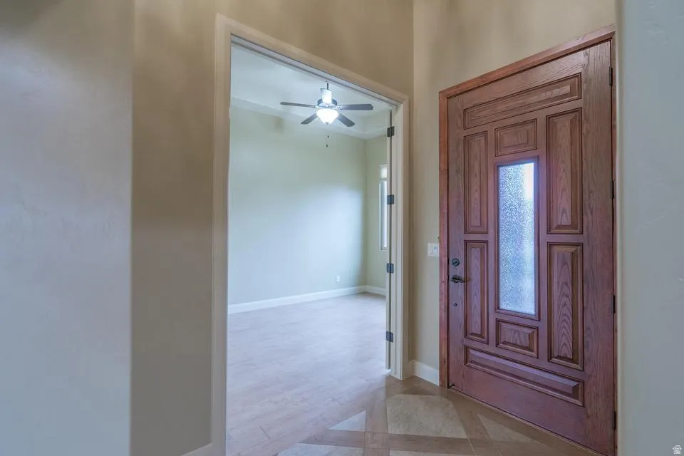 Paneled front entry door with frosted glass insert