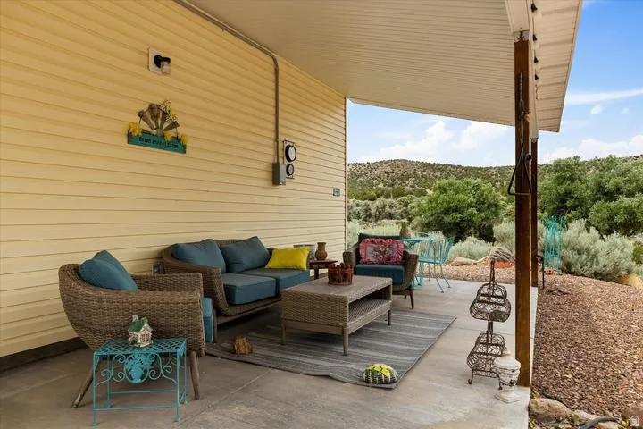 Covered patio with concrete flooring