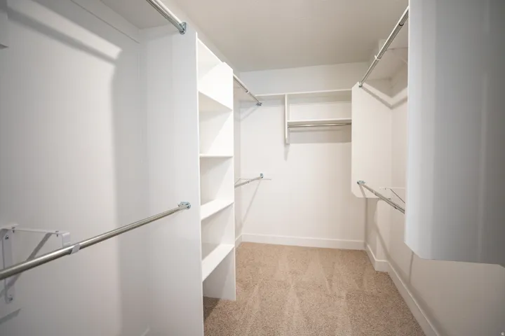Walkin closet for the primary bedroom