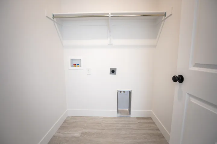 Laundry room with hookups for an electric washer and dryer
