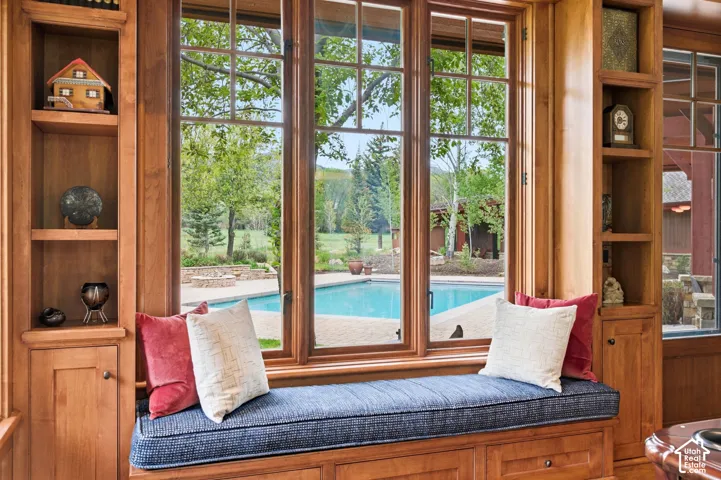 Built-in window seat with integrated storage drawers