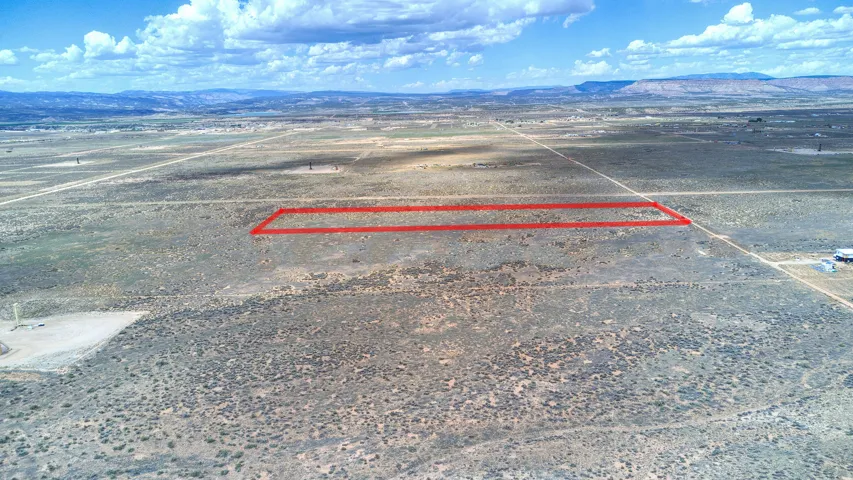 Expansive parcel featuring a defined rectangular boundary and surrounding arid landscape