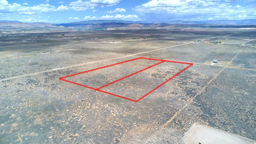 Expansive undeveloped land parcel with marked boundaries