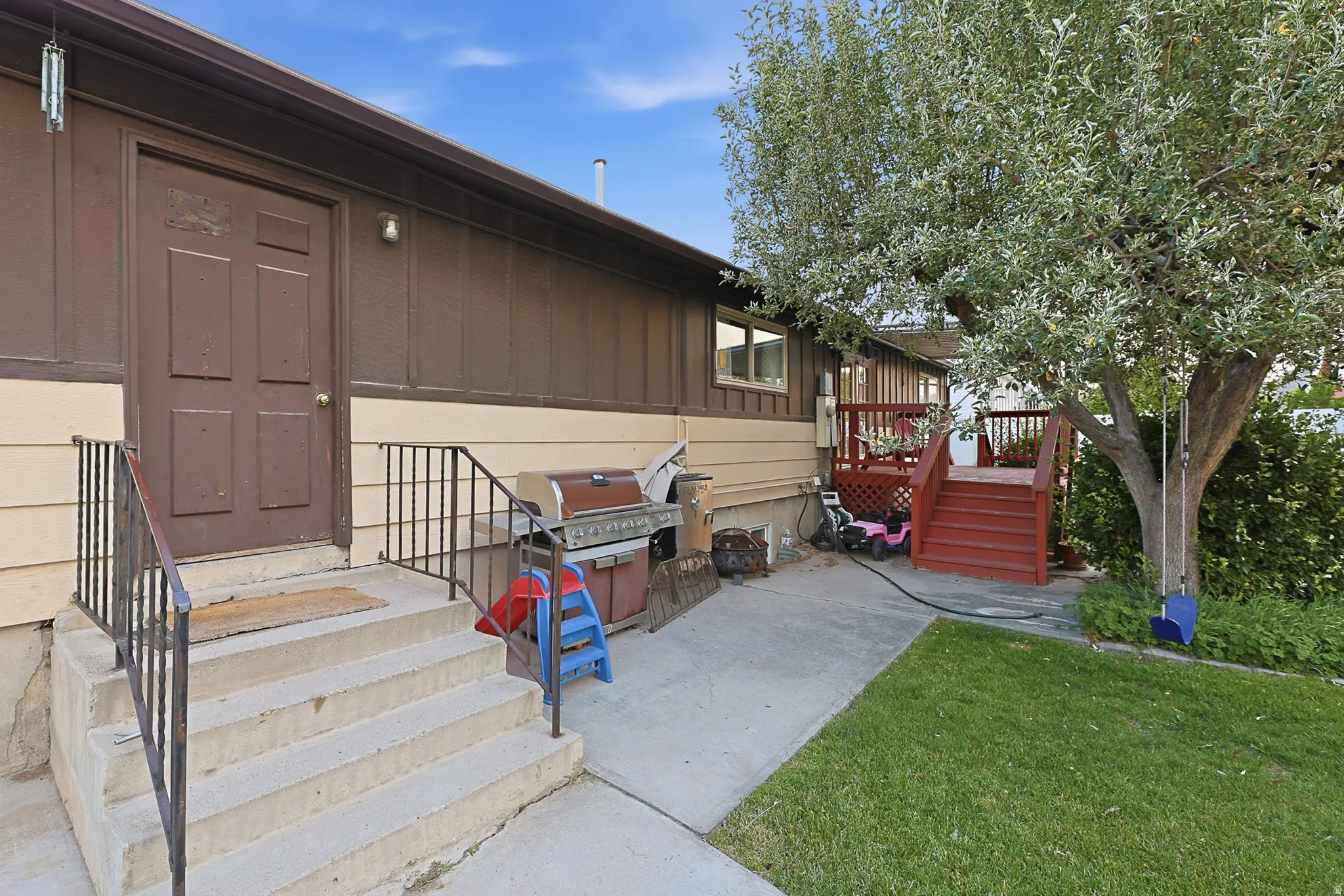 Back door entry into garage and basement entrance