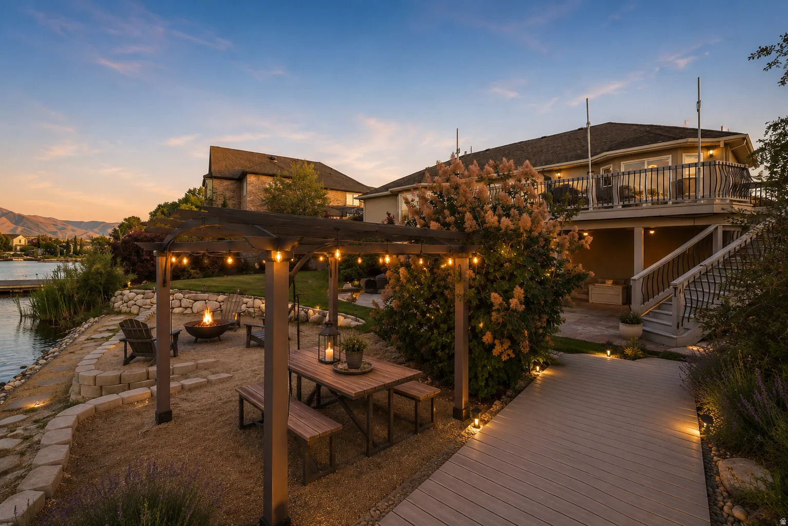 Waterfront patio featuring a wood pergola with string lighting, a fire pit, and a sea retaining wall. AI Stage