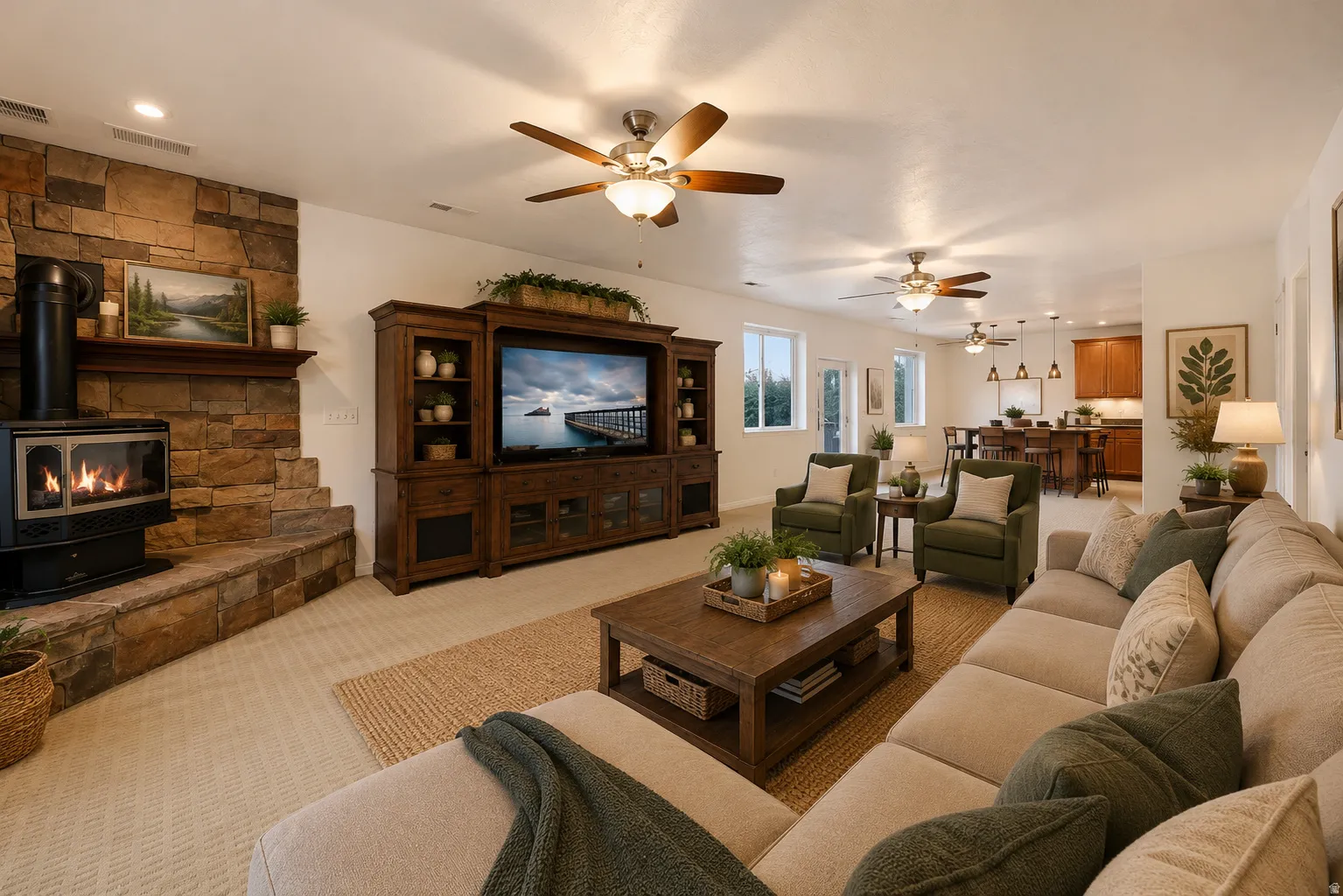 Spacious living area featuring a stone-clad fireplace with hearth, recessed lighting, and ceiling fans. AI Staged