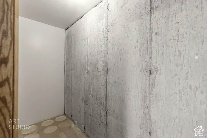 Unfinished concrete wall with a raw, industrial aesthetic