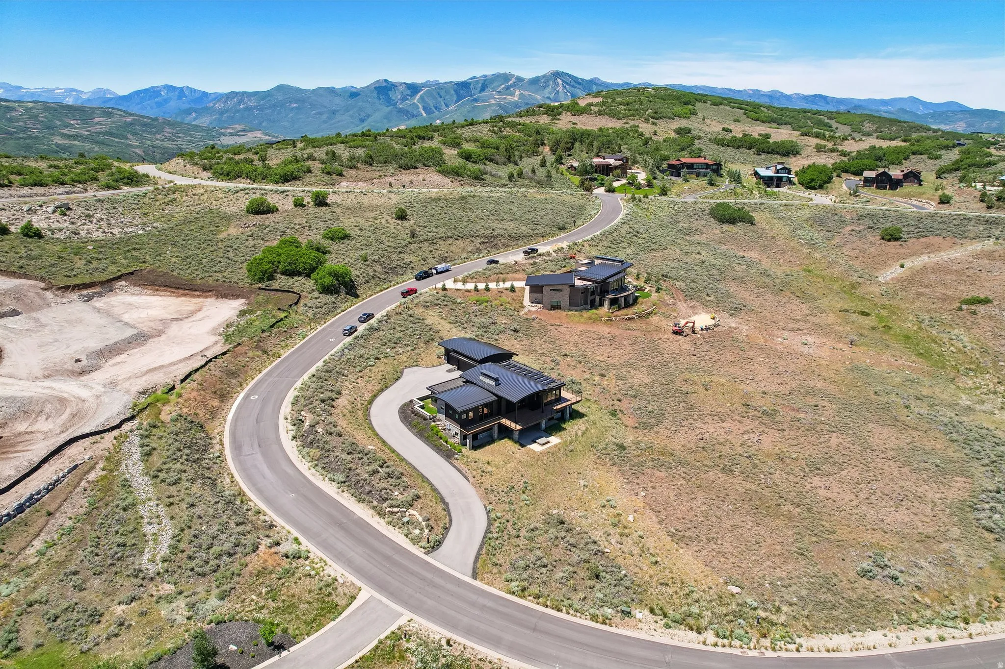Modern mountain residence featuring a multi-level design and a flat roofline
