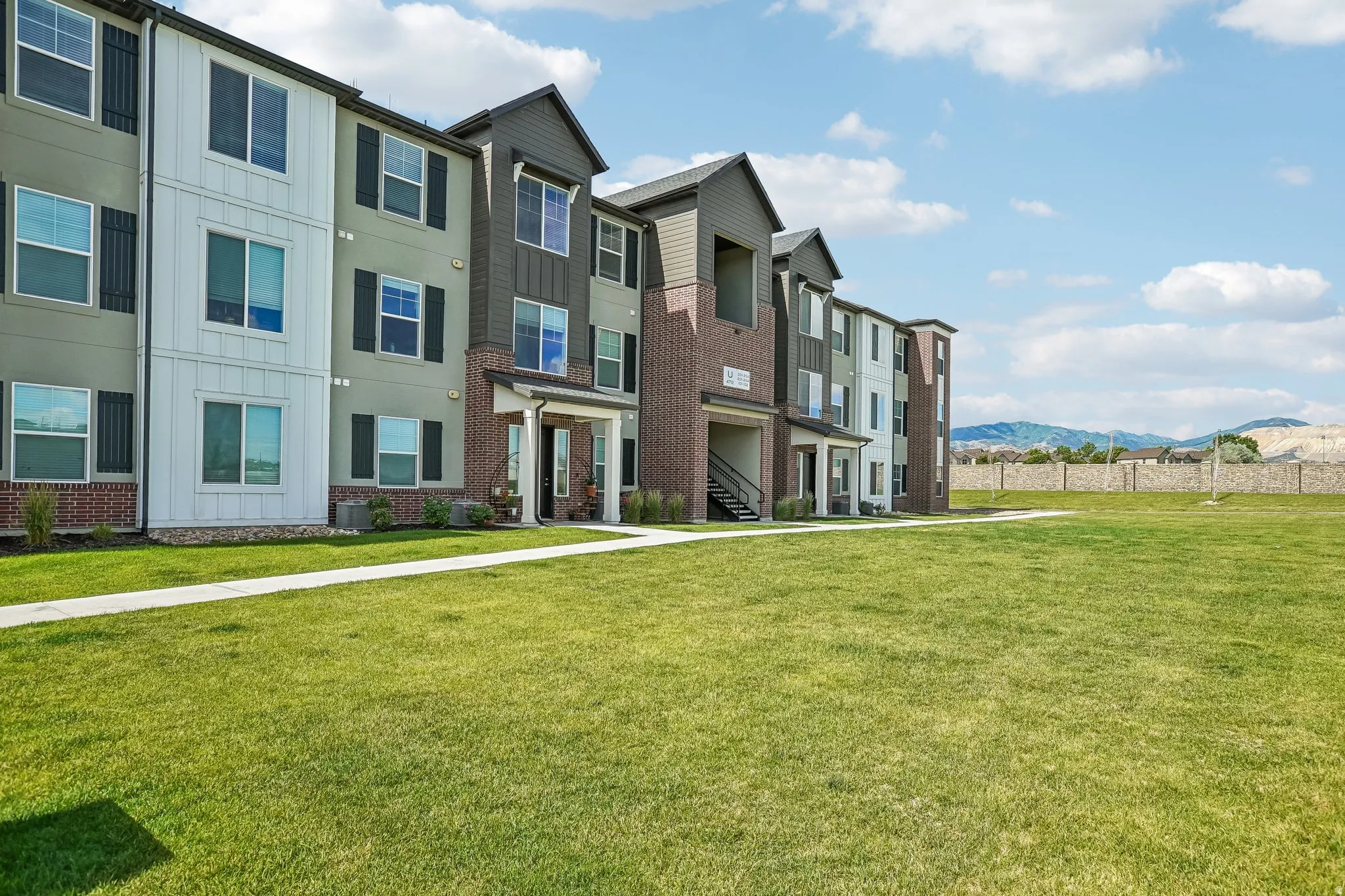 Nice large open green space in front of the building